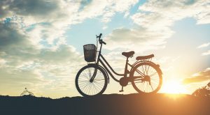 silhouette of bicycle parking on mountain scaled e1645093983905